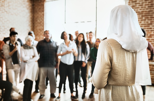 Muslim speaker in a workshop